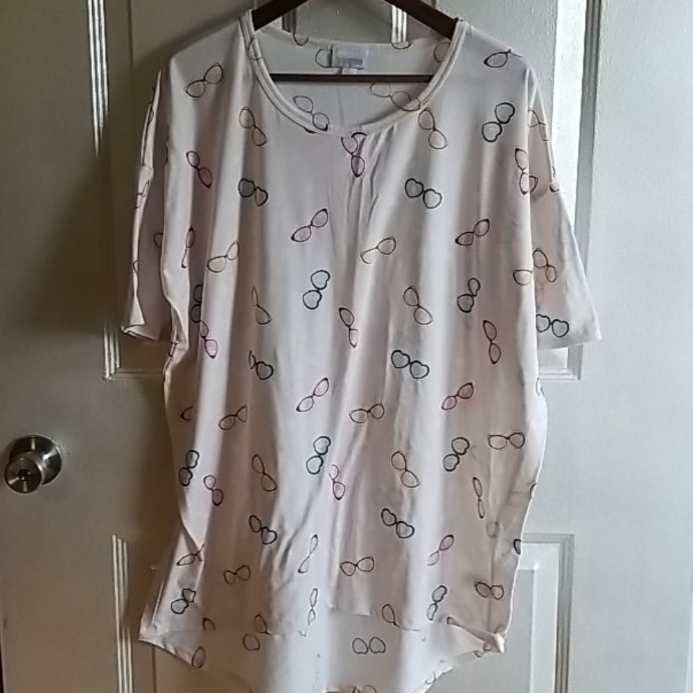 Light pink LuLaRoe top with pastel glasses